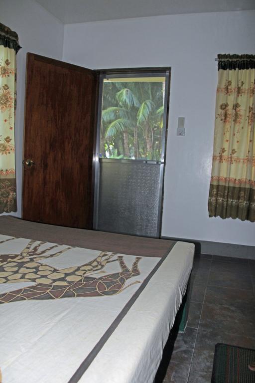 Marianita'S Cottages Mambajao Chambre photo