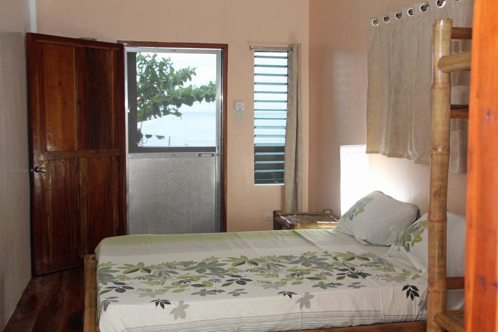 Marianita'S Cottages Mambajao Chambre photo